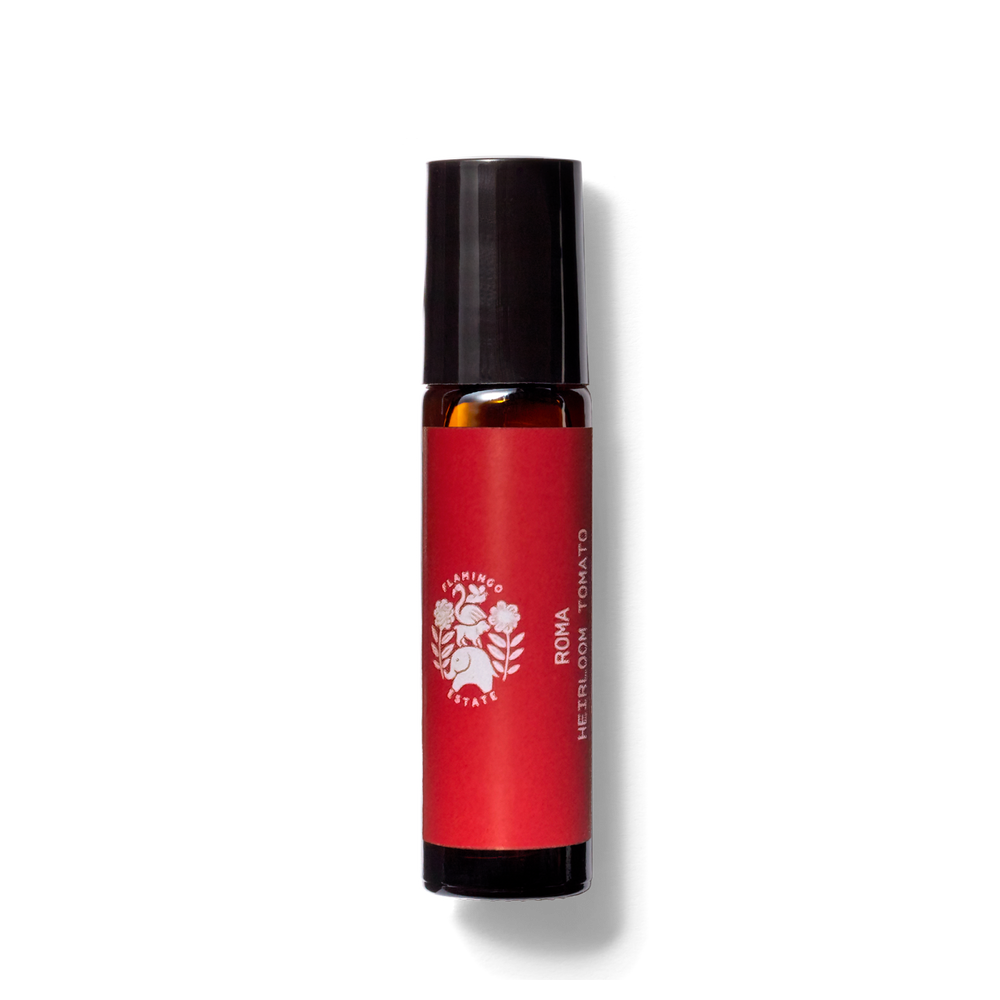 A cylindrical bottle stands upright, featuring a red label with white text and graphics.