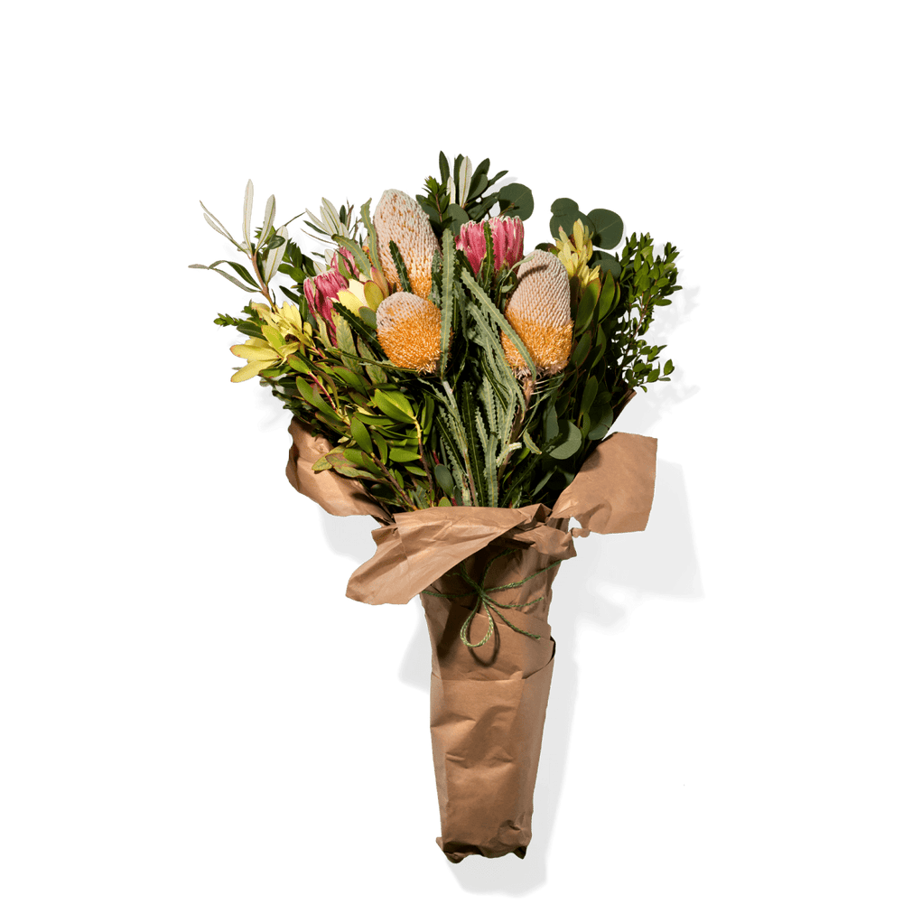 Vibrant Bouquet Of Assorted Flowers And Greenery, Arranged In Rustic-Style Paper Wrapping