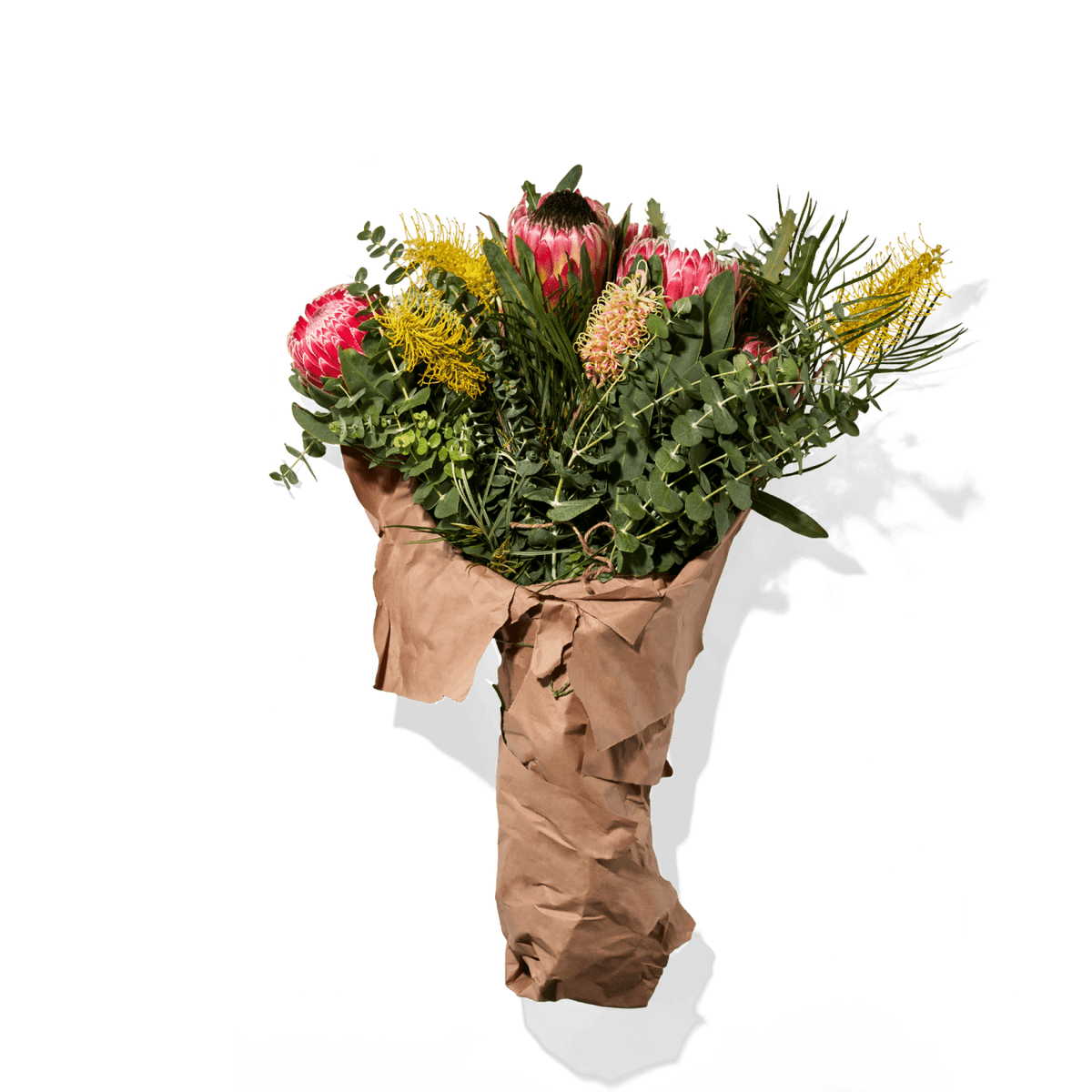 Vibrant Bouquet Of Assorted Flowers And Greenery, Arranged In Rustic-Style Paper Wrapping