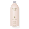 A sleek, light pink bottle labeled 