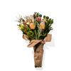 Vibrant Bouquet Of Assorted Flowers And Greenery, Arranged In Rustic-Style Paper Wrapping